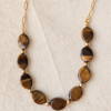 Ramla tiger’s eye necklace with gold spacer beads and textured paperclip chain