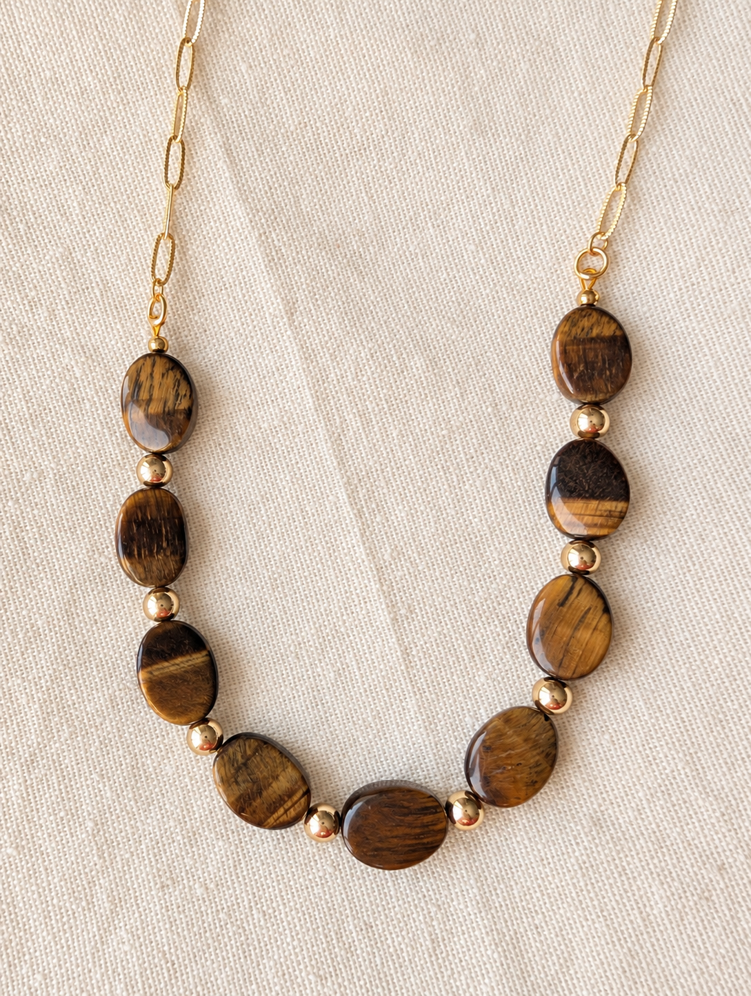 Ramla tiger’s eye necklace with gold spacer beads and textured paperclip chain